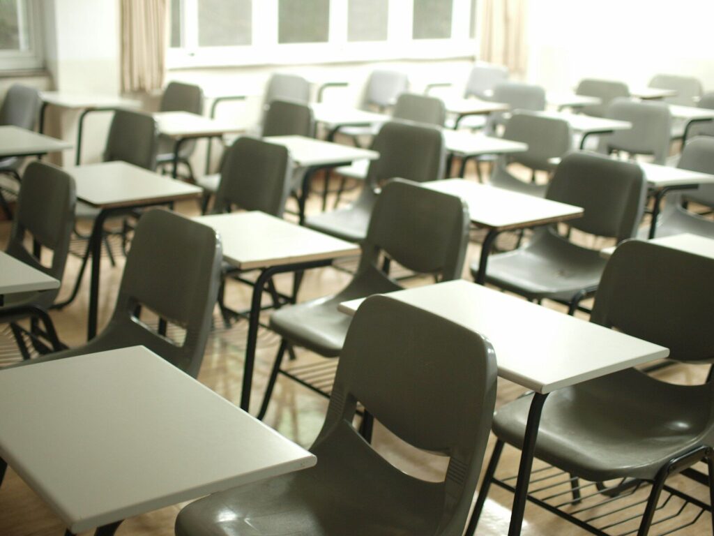 Photo by MChe Lee white table with black chairs
